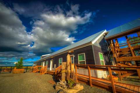 Cannery Lodge in Kenai, Alaska featuring ASC Building Products' Nu-Wave Corrugated Roofing and Klondike Siding