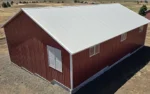 This Nor-Clad® Barn in Goldendale, WA uses ASC Building Products' Rustic Red for siding, Desert Beige for roofing and Winter White for the trim.