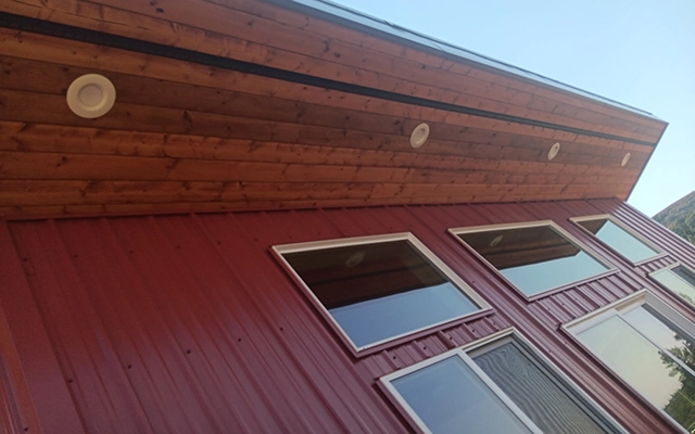 This Nor-Clad® cabin in High Prarie, WA uses Rustic Red and Old Zinc Gray DTxl to create a traditional looking cabin that will last for years.