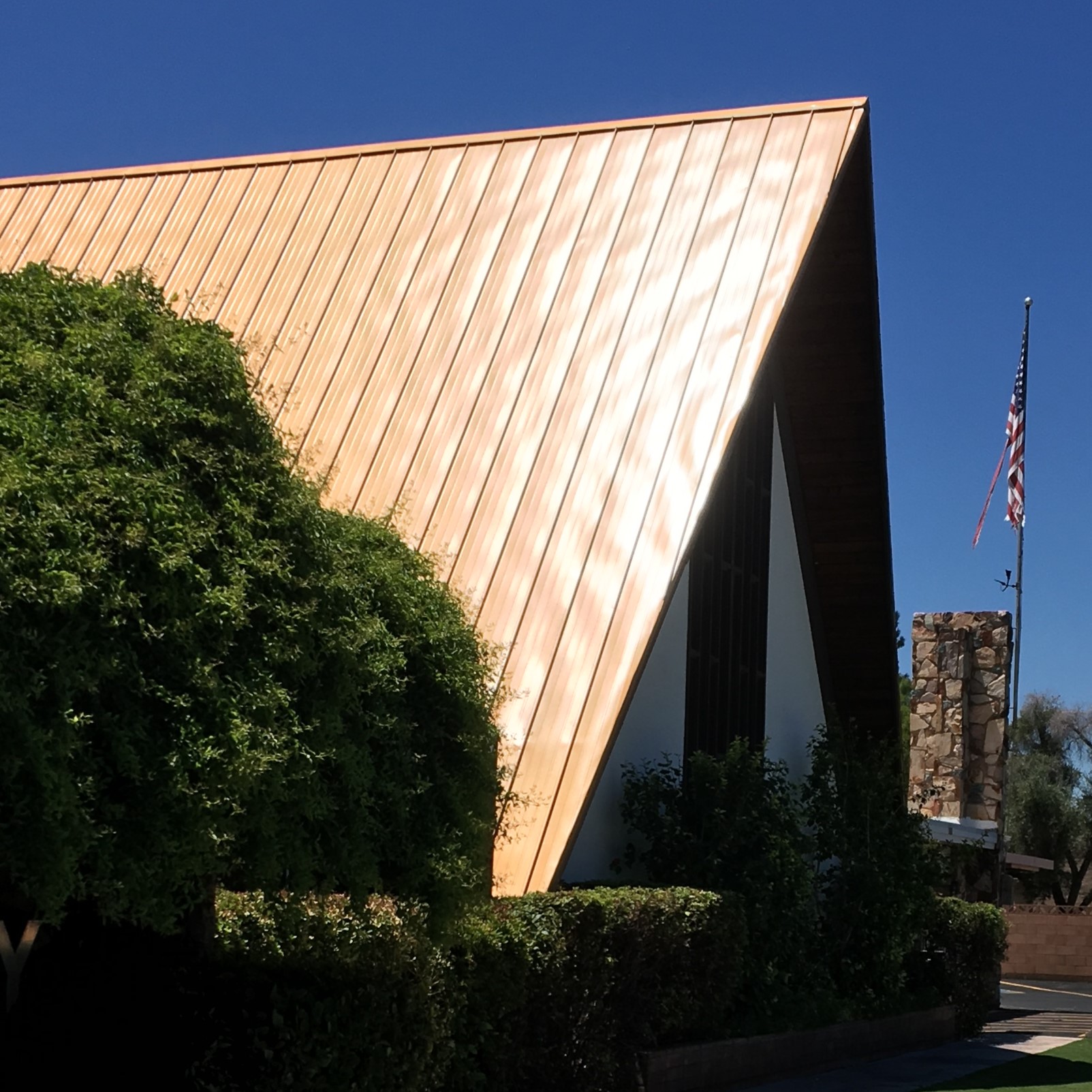 Metal Roofing Showing oil canning waviness