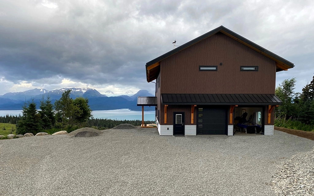 This residential home in Homer, AK features AEP Span's Nu-Wave Corrugated® in Natural Matte & ZINCALUME® siding colors.