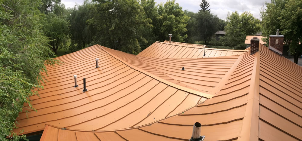 Various roof segments in Skyline Roofing’s Copper Penny color meet at the top to create a beautiful canopy. 