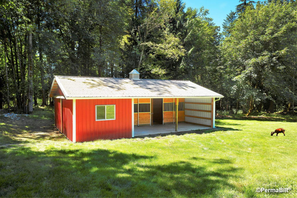 A small barn featuring our Nor-Clad® panels in Rustic Red, Winter White & Taupe.