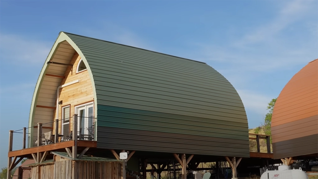 Nor-Clad® Metal Roofing was selected in six of ASC Building Products' colors to create the ombre style affect on these cabins in Idaho.