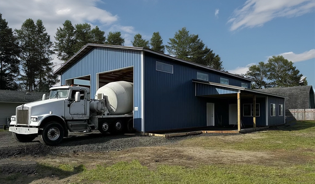 Residential Shop with Office in Westport. WA featuring ASC Building Products' Nor-Clad® Metal Siding in a Tahoe Blue with Winter White Trim.