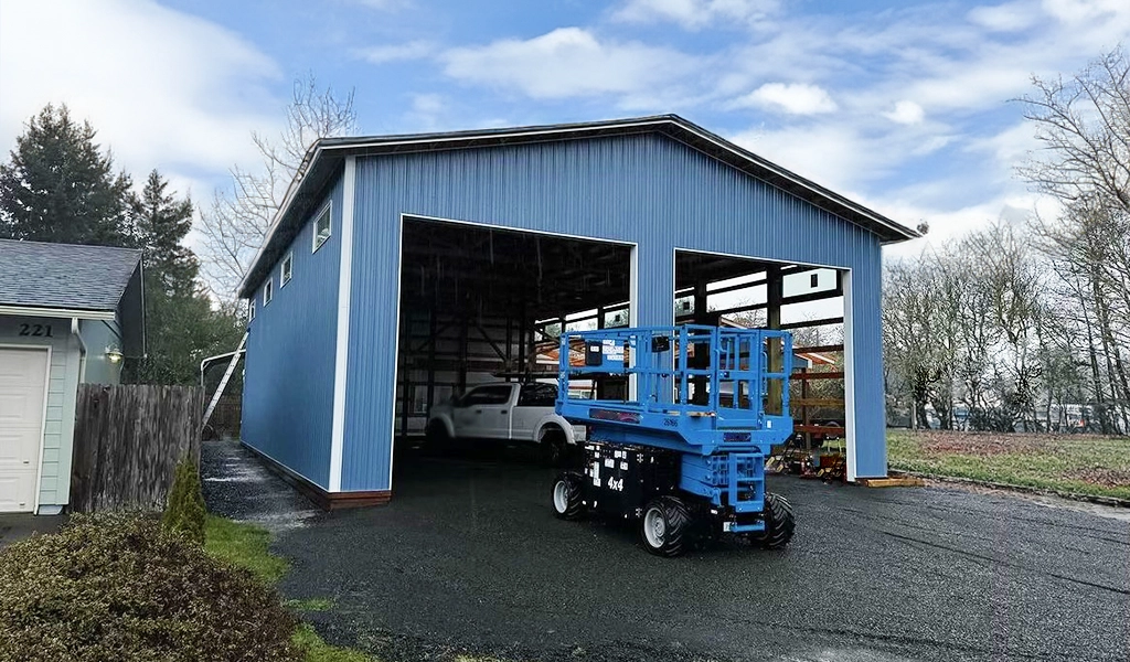 Residential Shop with Office in Westport. WA featuring ASC Building Products' Nor-Clad® Metal Siding in a Tahoe Blue with Winter White Trim.