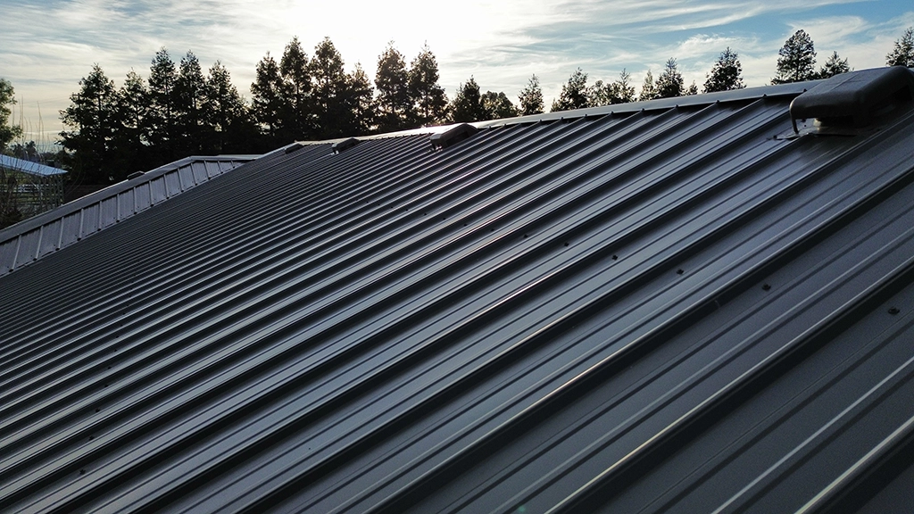 Strata-Rib® Residential home in Weathered Copper & Slate Gray metal roofing panels from ASC Building Products. Located in California.